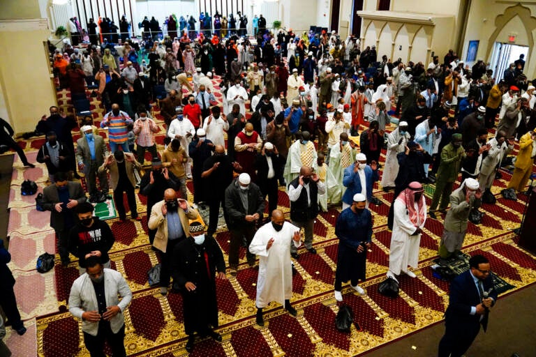File photo: Worshippers perform an Eid al-Fitr prayer at the Masjidullah Mosque in Philadelphia, Thursday, May 13, 2021. This year, in a rare convergence, Judaism’s Passover, Christianity’s Easter and Islam’s holy month of Ramadan are interlapping in April with holy days for Buddhists, Baha’is, Sikhs, Jains and Hindus, offering different faith groups a chance to share meals and rituals in a range of interfaith events.
