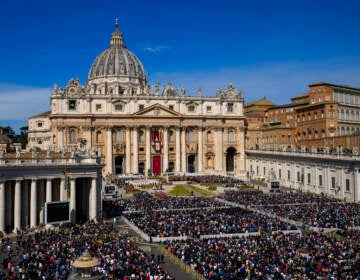 Faithful gather to attend the Catholic Easter Sunday mass led by Pope Francis in St. Peter's Square at the Vatican, Sunday, April 17, 2022. For many Christians, this weekend marks the first time in three years they will gather in person to celebrate Easter Sunday.