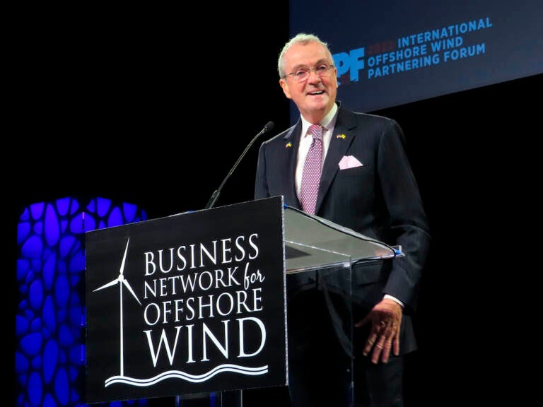 New Jersey Gov. Phil Muprhy speaks at an international offshore wind conference in Atlantic City NJ on April 28, 2022, where he announced that the developers of his state's first offshore wind farm will use a state-financed manufacturing facility to build the components for the project, called Ocean Wind 1. (AP Photo/Wayne Parry)