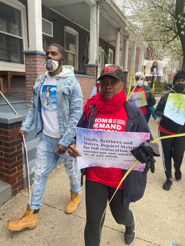 Treska Frisby, an organizer and survivor of gun violence, walks in Trenton's March For Peace on Palm Sunday