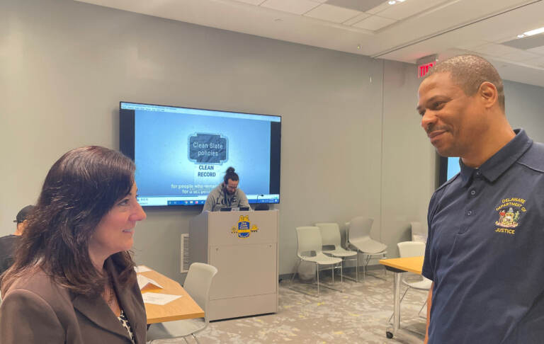 Public defender Lisa Minutola and community engagement specialist Corie Priest guided people through the expungement process. (Cris Barrish/WHYY)