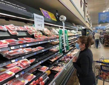 A shopper looks at beef at a Kroger store in Atlanta on May 5, 2020. (Jeff Amy/AP)