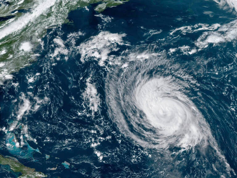 This GOES-16 East GeoColor satellite image taken Wednesday, Sept. 8, 2021, at 2:20 p.m. EDT, and provided by NOAA, shows Hurricane Larry in the Atlantic Ocean. The National Weather Service is warning that swells from Hurricane Larry will create dangerous rip current conditions