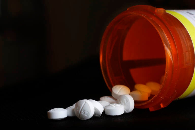 File photo: This photo shows an arrangement of Oxycodone pills. (AP Photo/Mark Lennihan, File)