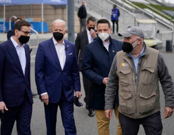 Celebrity chef José Andrés (right) is the founder of World Central Kitchen, a nonprofit organization that serves meals to people affected by humanitarian crises. Here, President Biden (second from left) arrives to meet with Ukrainian refugees and humanitarian aid workers during a visit to Warsaw, Poland, on March 26. (Evan Vucci/AP)