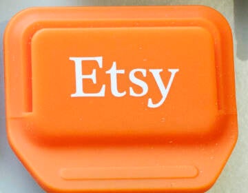 FILE - This Tuesday, Jan. 6, 2015 file photo shows an Etsy mobile credit card reader, in New York. The online crafts retailer on Tuesday, March 31, 2015 said it expects to raise as much as $267 million from an initial public offering values the company at up to $1.78 billion. (AP Photo/Mark Lennihan, File)