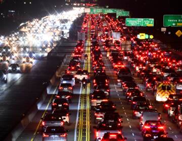 The 405 Freeway is packed with rush-hour traffic last month in Los Angeles. Americans' greatest contribution to global greenhouse gas emissions comes from transportation, mostly from cars and trucks, according to the federal government. (Patrick T. Fallon/AFP via Getty Images)