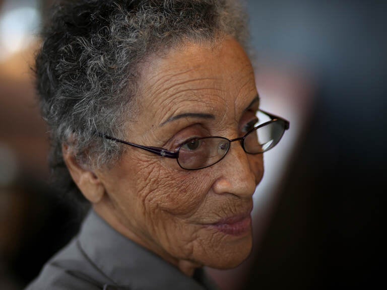 National Park Service ranger Betty Reid Soskin, 100, retired on Thursday. She's seen here in 2013, working at the Rosie the Riveter/World War II Home Front National Historical Park in Richmond, Calif. (Justin Sullivan/Getty Images)