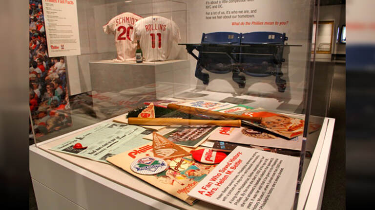 File photo of Commemorative memorabilia from the 1980 Phillies World Series championship on display at the Philadelphia History Museum. (WHYY, file)