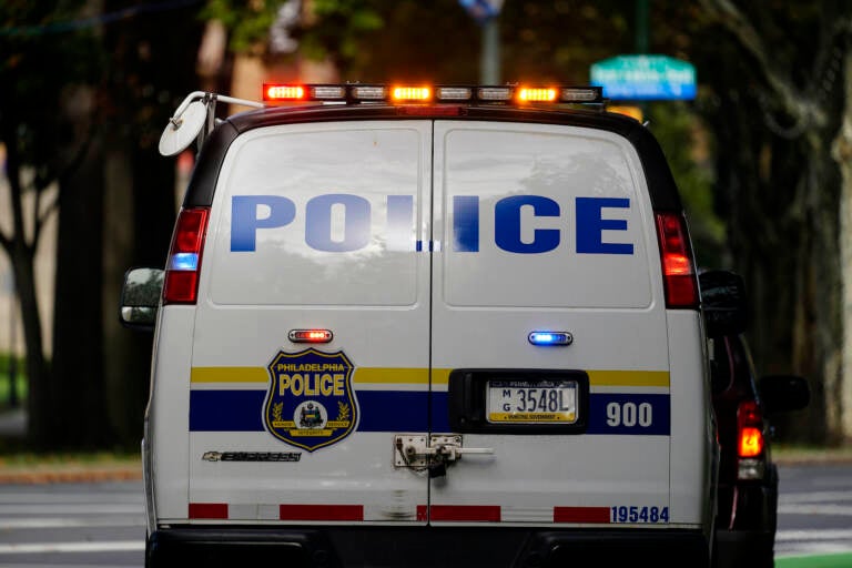 The back of a Philadelphia police van is seen on a street
