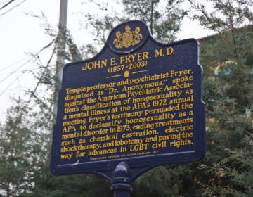 The historical marker that honors Dr. John Fryer at 13th and Locust Streets in Philadelphia. (Kimberly Paynter/WHYY)
