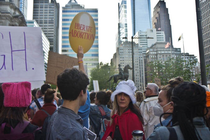 Philadelphians rallied for abortion rights outside City Hall on May 3, 2022, after a draft of an opinion by the U.S. Supreme Court overturning Roe v. Wade was leaked. (Kimberly Paynter/WHYY)
