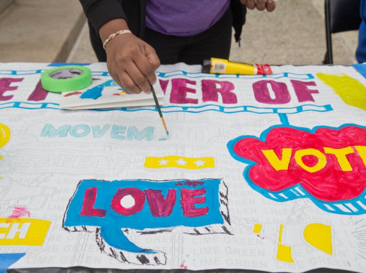 An art project is seen with the words ''vote'' and ''love'' visible