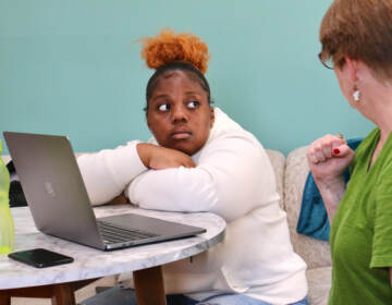 Presley Barner works with tutor Stephanie Schechner at YEAH Philly. (Emma Lee/WHYY)