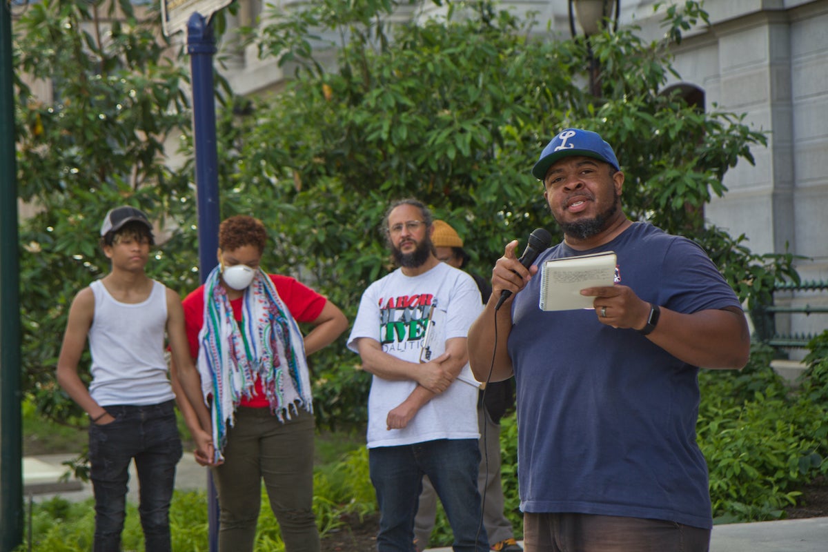 Keon Liberaty, president of Local 3013, called on organized labor leaders to take people into the streets to fight for more police accountability, fully funded schools, and against environmental racism, at the Labor for Black Lives Coalition’s vigil for George Floyd outside City Hall in Philadelphia on May 25, 2022. (Kimberly Paynter/WHYY)