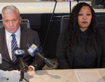 Tawainna Anderson (right) and her attorney at the announcement of Anderson's suit in Philadelphia U.S. District Court against TikTok. (Tom MacDonald/WHYY)