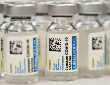This Saturday, March 6, 2021, file photo shows vials of Johnson & Johnson COVID-19 vaccine at a pharmacy in Denver.  (AP Photo/David Zalubowski, File)