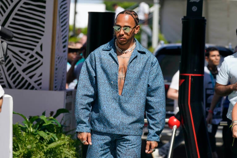 Mercedes driver Lewis Hamilton of Britain arrives at the Formula One Miami Grand Prix auto race at Miami International Autodrome, Friday, May 6, 2022, in  Miami Gardens, Fla. (AP Photo/Darron Cummings)