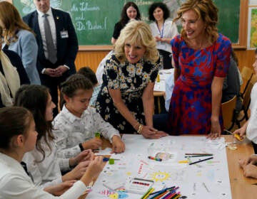 First lady Jill Biden and first lady of Romania Carmen Iohannis visit the Școala Gimnaziala Uruguay, or Uruguay School, in Bucharest Romania, Saturday, May 7, 2022. Biden visited several classrooms to visit with children and the educators who are helping teach displaced Ukrainian children