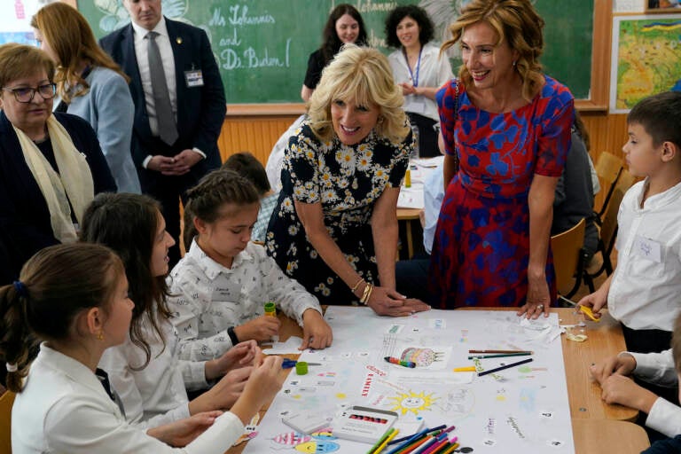 First lady Jill Biden and first lady of Romania Carmen Iohannis visit the Școala Gimnaziala Uruguay, or Uruguay School, in Bucharest Romania, Saturday, May 7, 2022. Biden visited several classrooms to visit with children and the educators who are helping teach displaced Ukrainian children