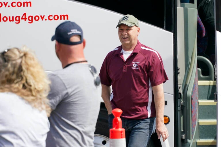 File photo: Pennsylvania state Sen. Doug Mastriano, R-Franklin, right,,a Republican running for Governor of Pennsylvania, arrives at a campaign stop Tuesday, May 10, 2022, in Portersville, Pa. (AP Photo/Keith Srakocic)