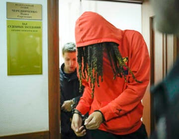 WNBA star and two-time Olympic gold medalist Brittney leaves a courtroom in Khimki just outside Moscow, Russia, Friday, May 13, 2022. Griner was detained Feb. 17 and a hearing in a Russian court could come as early as Friday, or anytime before May 19 when her detention period is scheduled to end. The court will likely extend her pre-trial detention. (AP Photo/Alexander Zemlianichenko)