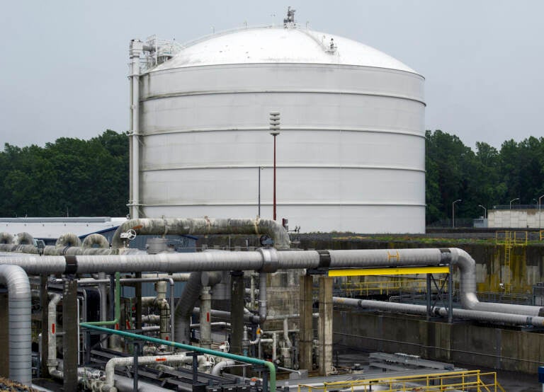 Transfer pipes carry liquified natural gas to and from a holding tank. (AP Photo/Cliff Owen)