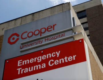 A close-up of the Cooper University Hospital sign.