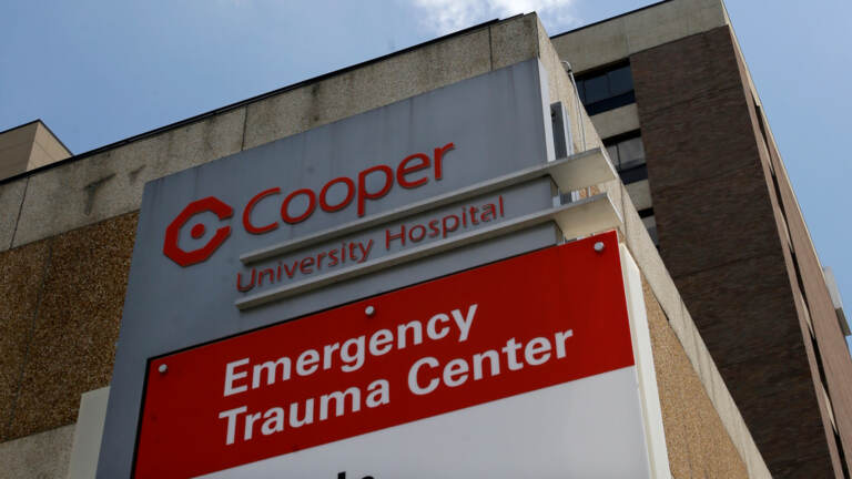 A close-up of the Cooper University Hospital sign.