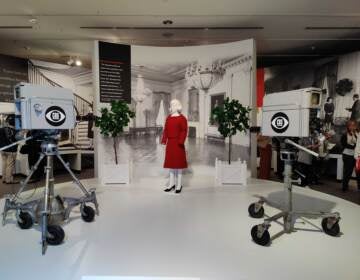 A mock-up of the CBS TV production inside the White House. The Jackie Kennedy mannequin is dressed in a re-creation of the red suit she wore for the TV house tour