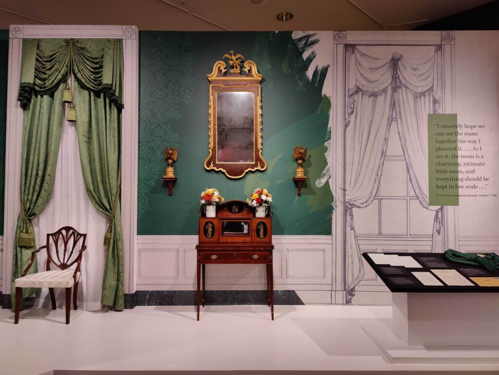 The recreation of the White House’s Green Room at Winterthur. Kennedy put a textured green fabric on the walls