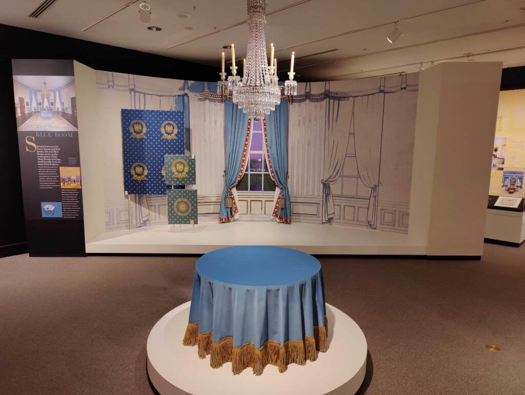 A recreation the White House’s Blue Room inside the Winterthur gallery. Jackie Kennedy softened what she called ''hard blue'' by adding white wallpaper for a French styling