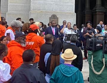 Interfaith leaders, youth mentors, law enforcement representatives and elected officials spoke at an anti-gun violence rally at City Hall Thursday. Mothers in Charge, a nonprofit led by mothers who've lost children to gunfire, organized the event. (Sammy Caiola/WHYY)