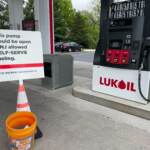 Orange cones at the Lukoil gas station on Route 1 South in West Windsor altering motorists that the gas pump would be open for self-service if New Jersey allowed it. It was part of a demonstration to support a bill in the Assembly that would allow a self-serve option. (P. Kenneth Burns/WHYY)