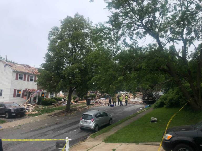 The scene outside the house that exploded near Butler Avenue in Pottstown, Montgomery County. (Emily Rizzo/WHYY)