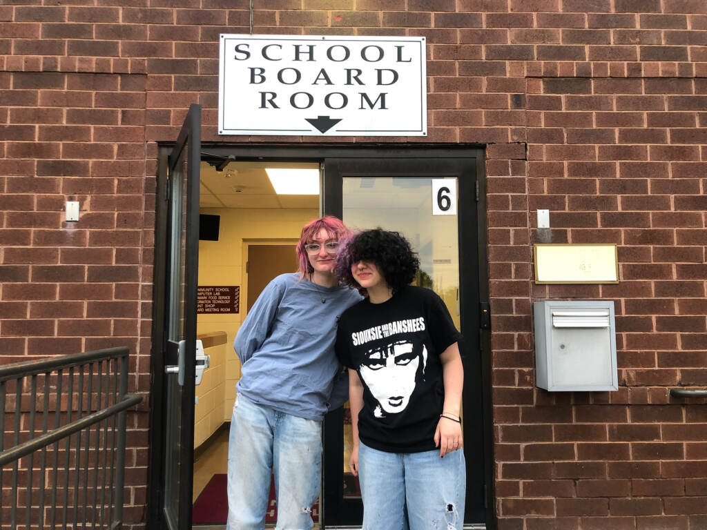 Julien Jones and Rowan Hopwood stand in the doorway of a Central Bucks school