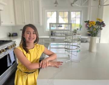 Mia Ellen Ruggieri of Bala Cynwyd made 100 earrings with her mom to help raise money for to support the Ukrainian people. (Courtesy of Jill Ellen Ruggieri)