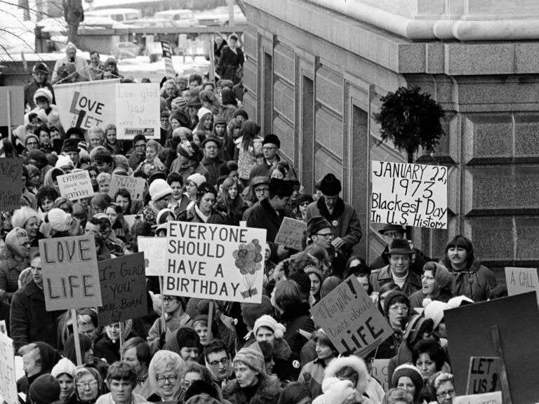 People march around the Minnesota Capitol building protesting the U.S. Supreme Court's Roe v. Wade decision in St. Paul, Minn., in January. (AP)