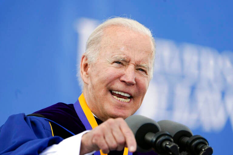 President Joe Biden points emphatically during his commencement speech to University of Delaware graduates.