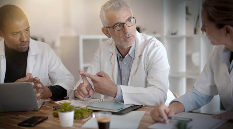 doctors on a work meeting in a meeting room in a hospital