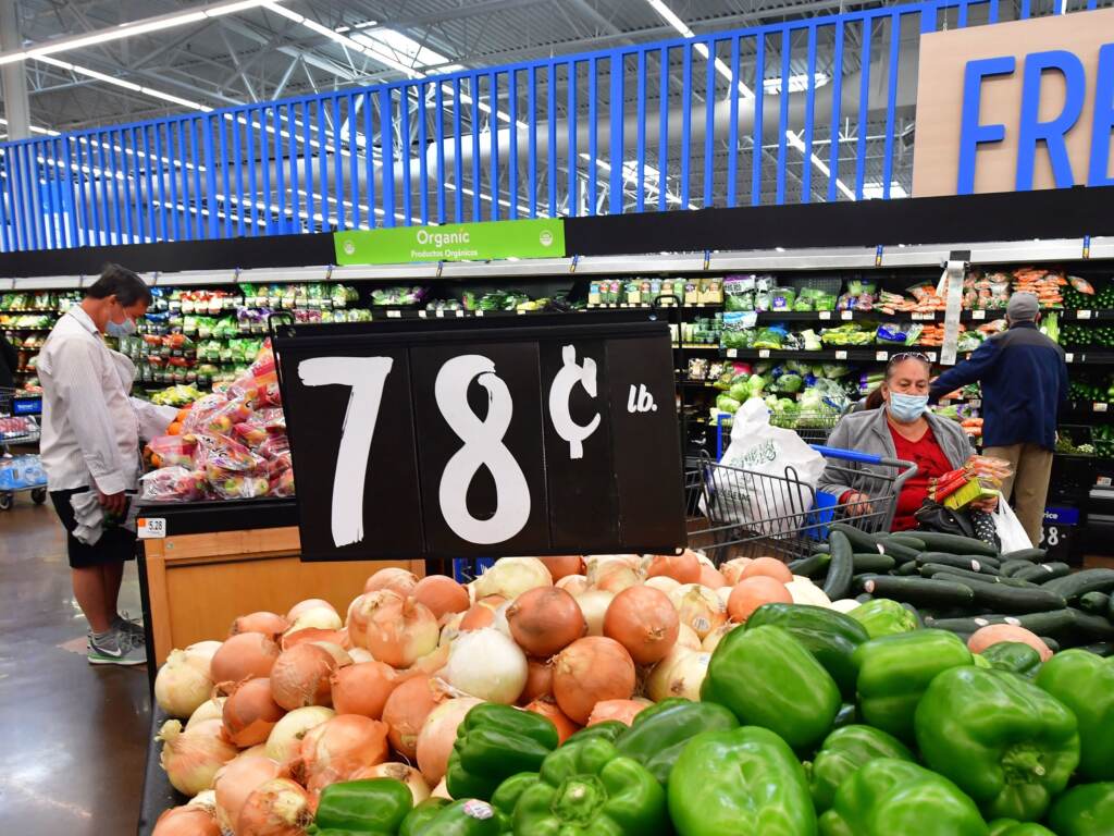 A sign displays the price of produce as 78 cents per pound