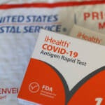 The federal government is sending out a third round of free rapid antigen COVID-19 tests through the U.S. Postal Service. (Justin Sullivan/Getty Images)