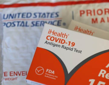 The federal government is sending out a third round of free rapid antigen COVID-19 tests through the U.S. Postal Service. (Justin Sullivan/Getty Images)