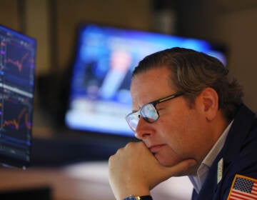 Traders work the floor of the New York Stock Exchange in New York City on Thursday. Stocks fell sharply a day after the Federal Reserve raised interest rates by the most in over two decades. (Michael M. Santiago/Getty Images)

