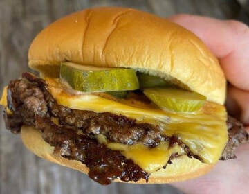 A burger from Mike's BBQ on a Martin's potato roll