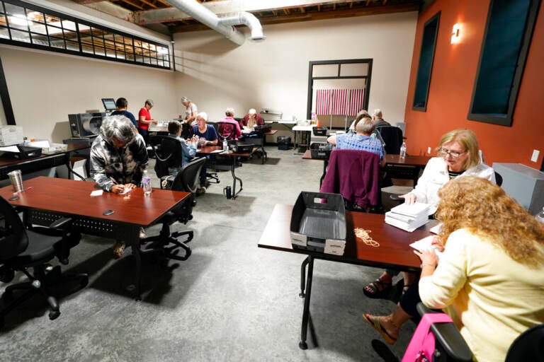 Election workers are shown counting ballots in Pennsylvania's GOP U.S. Senate primary race.