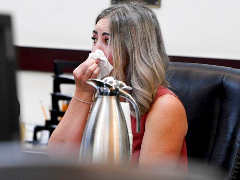 RaDonda Vaught listens to victim impact statements during her sentencing in Nashville. She was found guilty in March of criminally negligent homicide and gross neglect of an impaired adult after she accidentally administered the wrong medication. (Nicole Hester/AP)