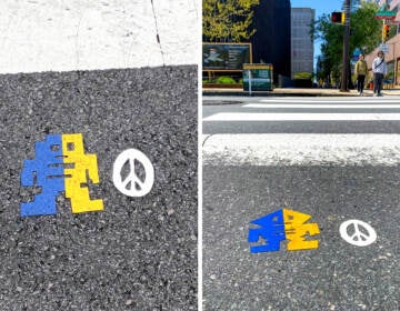 A blue and yellow figure is visible on a crosswalk in two photos side-by-side.