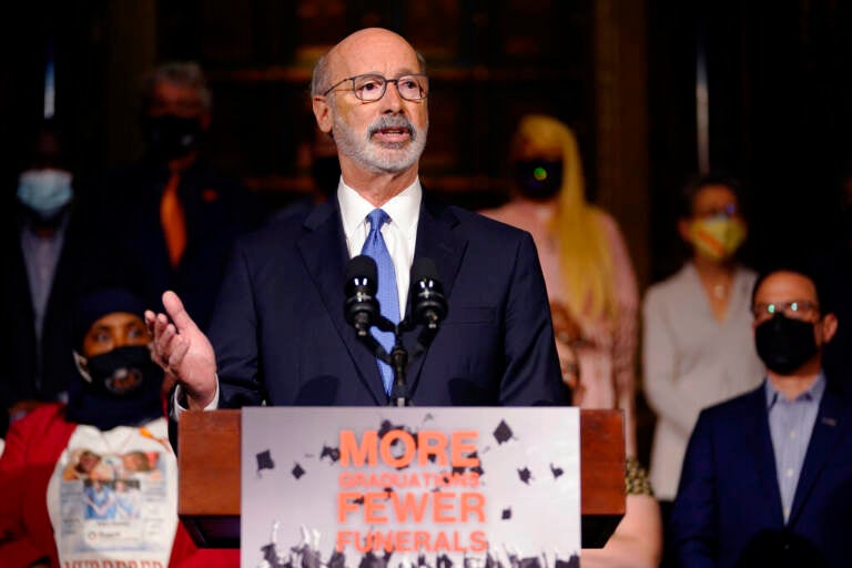 Gov. Tom Wolf speaks from a podium.