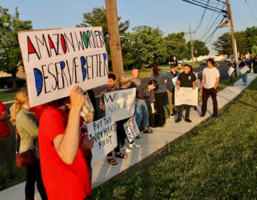 Supporters of Amazon workers gather outside a warehouse in Bellmawr